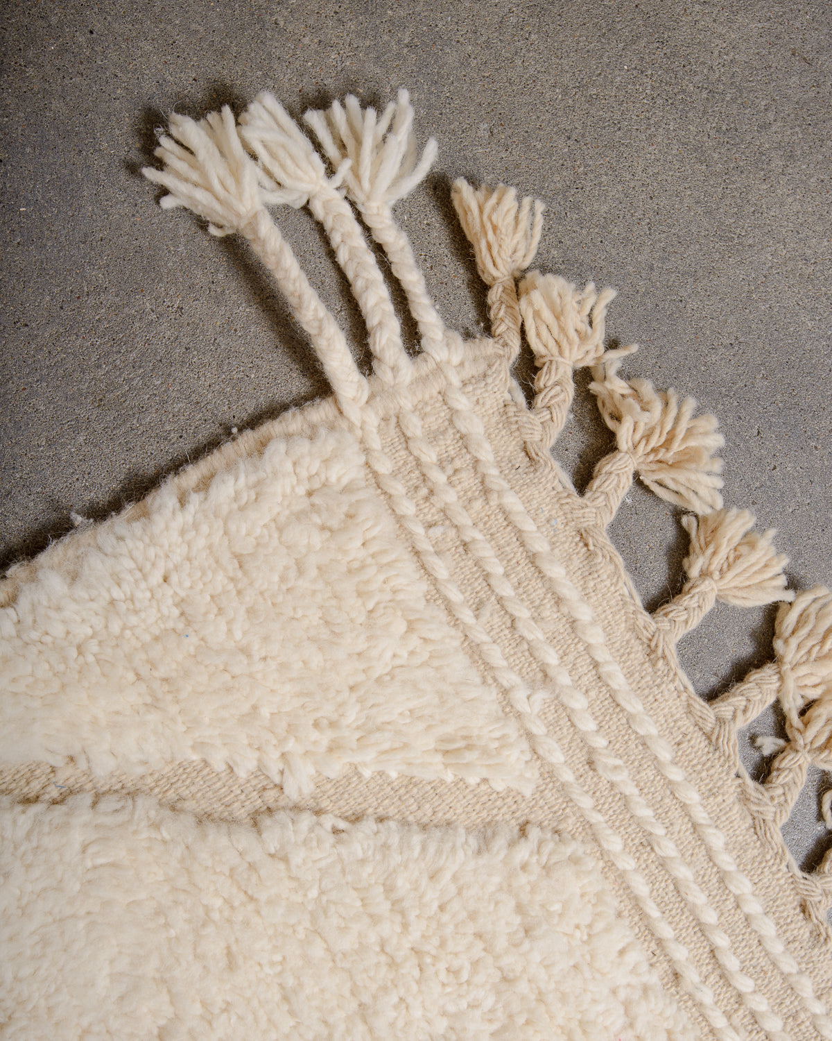 Modern, designer, handcrafted Berber rug from Morocco. Beniourain carpet with minimalist design, natural wool pile and a fluffy texture.